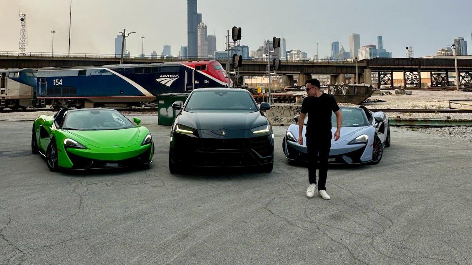 Three Axel Luxury exotic rentals in front of the Chicago skyline